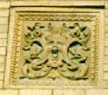 Face in the brickwork of the library